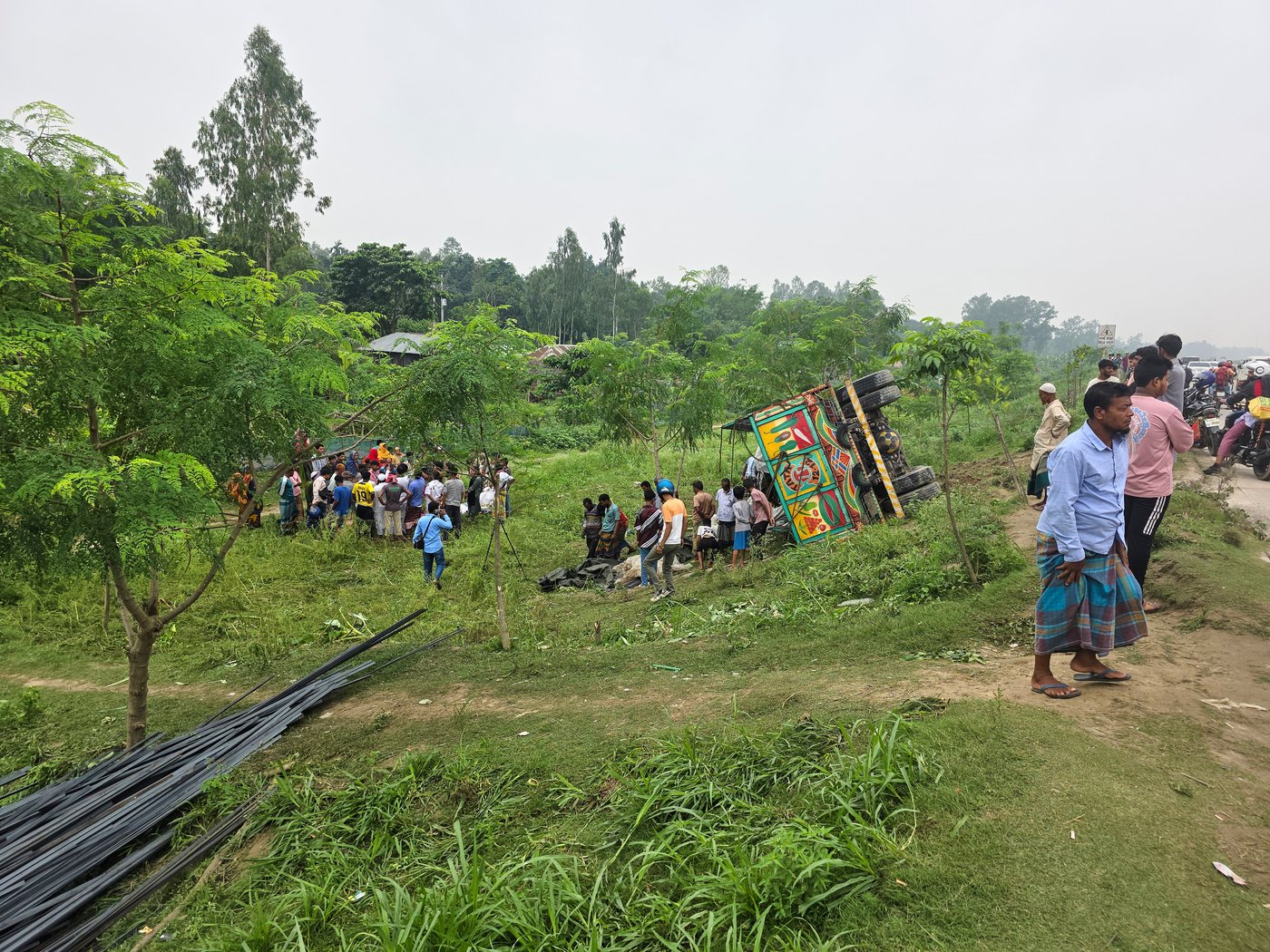 Truck overturns in central Bangladesh, killing at least 15 people | iNwheels Truck overturns in central Bangladesh, killing at least 15 people | iNwheels