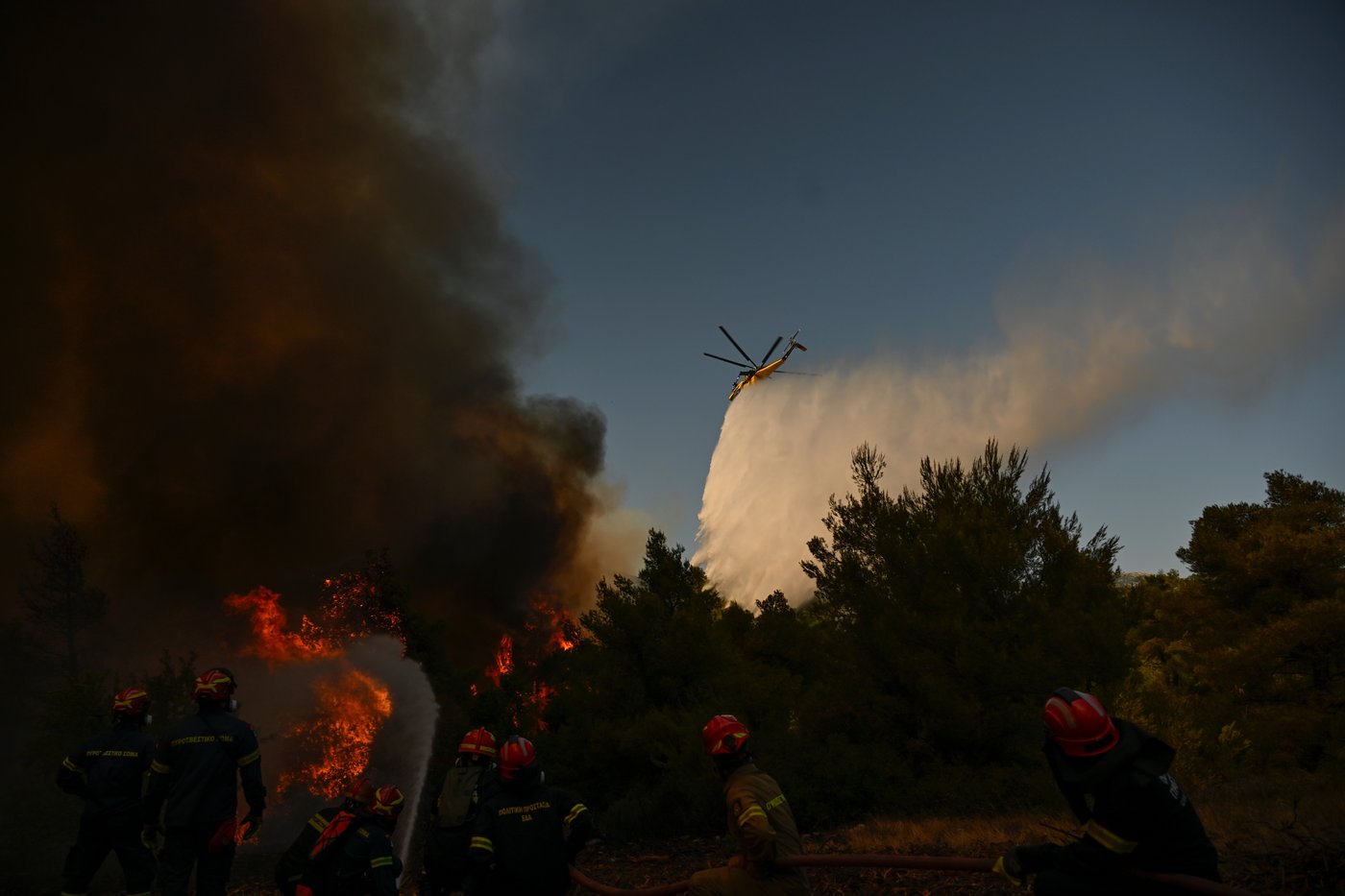 Photos show destruction from wildfires in Greece as blazes take hold in Europe and parts of the US | iNFOnews.ca