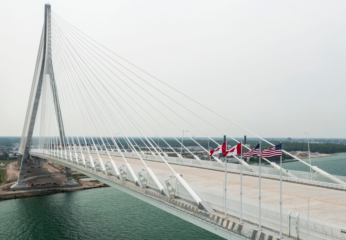 US-Canada bridge opens in Detroit even as trade disputes test the neighbors' ties | iNwheels US-Canada bridge opens in Detroit even as trade disputes test the neighbors' ties | iNwheels