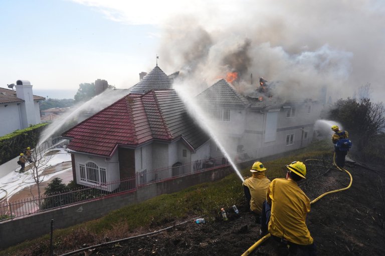 Multiple Southern California homes are ablaze in a fast-moving wildfire fueled by hot wind | iNwheels
