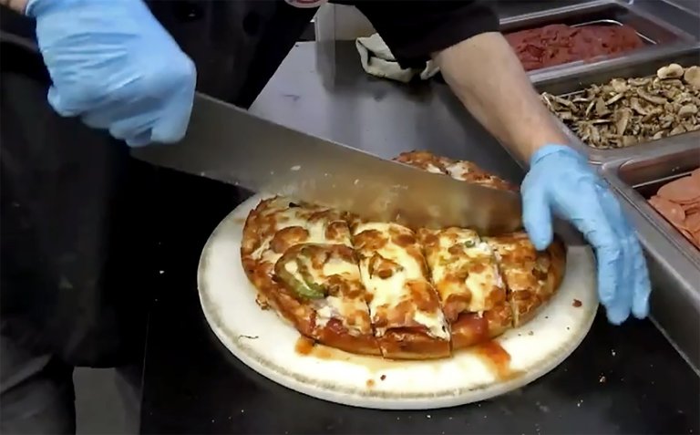 What is Regina pizza? It's Greek, good and gets under the crust of Rider rivals | iNFOnews.ca
