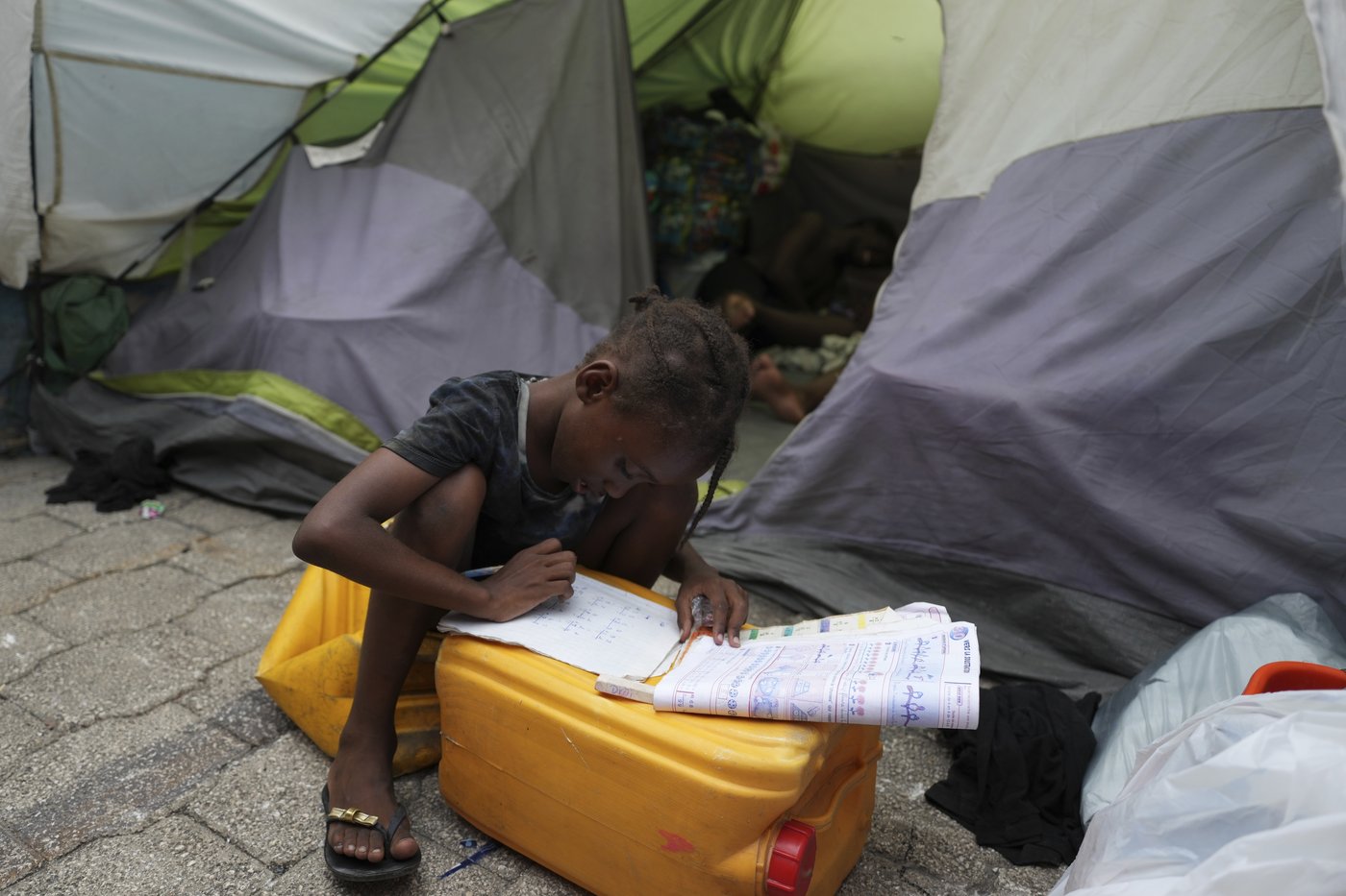 Haitians give cautious welcome to new international force approved by UN to tackle gangs | iNFOnews.ca