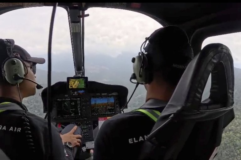 Indonesian rescuers find helicopter crash site on Borneo and recover 1 body so far | iNFOnews.ca