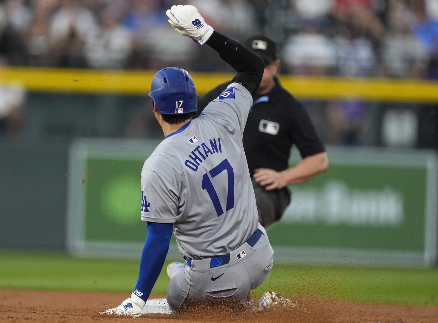 Ohtani launches homer No. 54, steals 57th base as NL West-champion Dodgers power by Rockies 11-4 | iNFOnews.ca