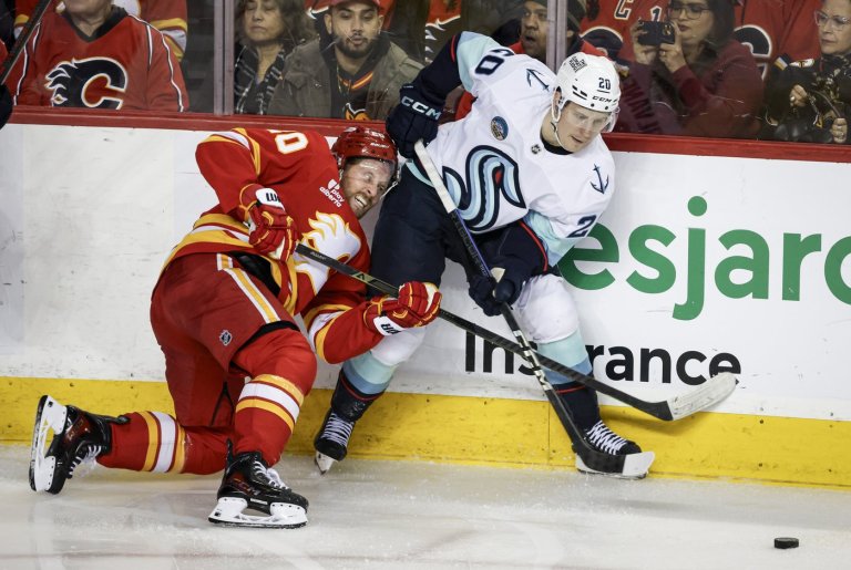 Surging Kraken score four times in third period to burn Flames 5-1 | iNFOnews.ca