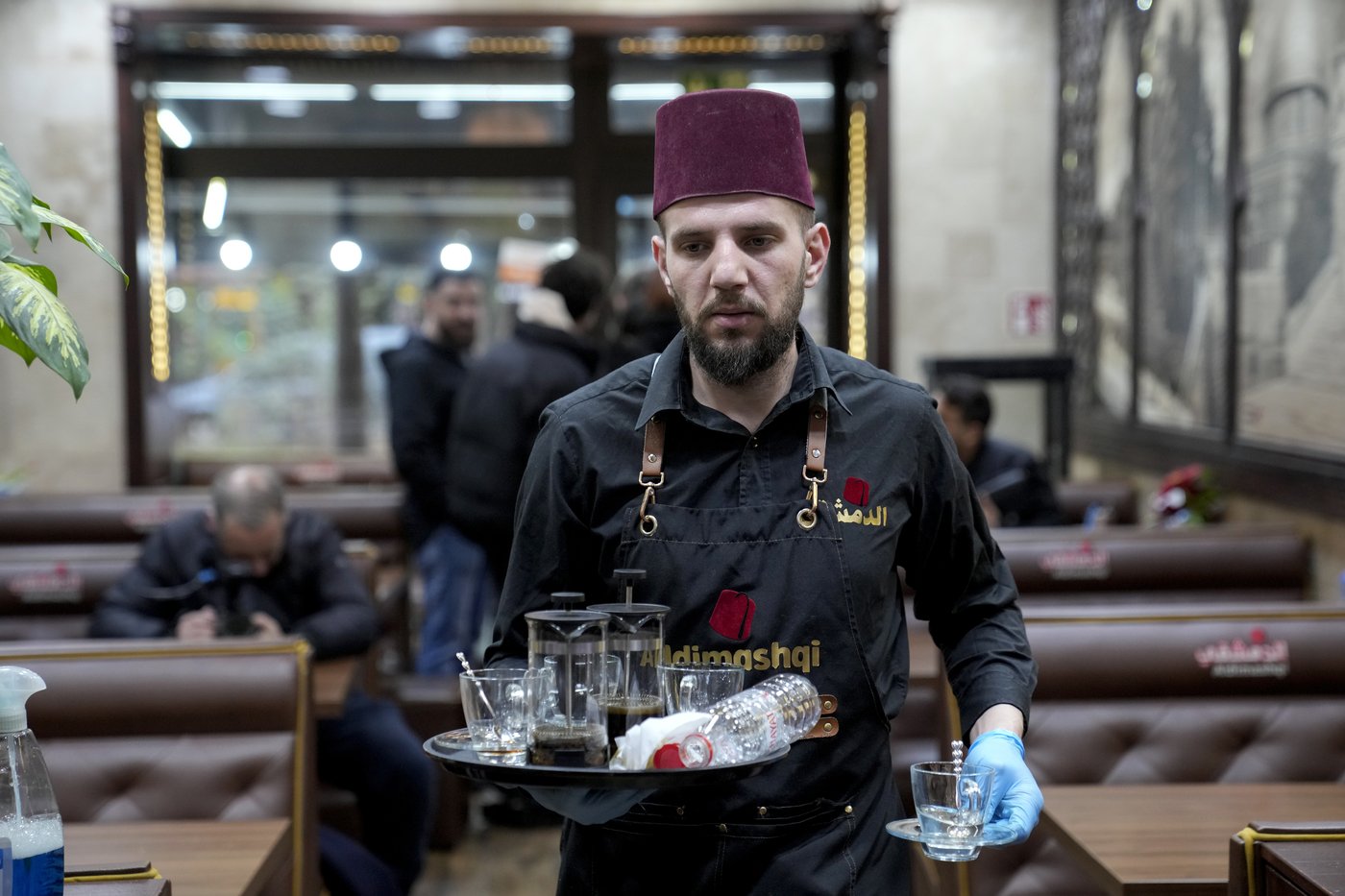 Syrians in Germany worried by some politicians' eagerness for them to go home after Assad's fall | iNFOnews.ca