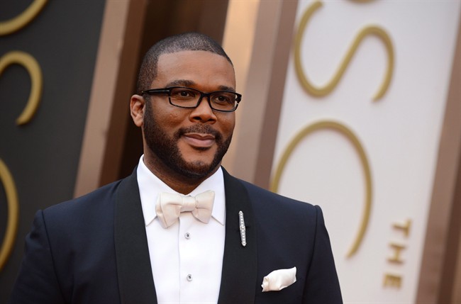 Filmmaker Tyler Perry meets with Tanzanian children with albinism living in home he funded | iNFOnews.ca CP34482258