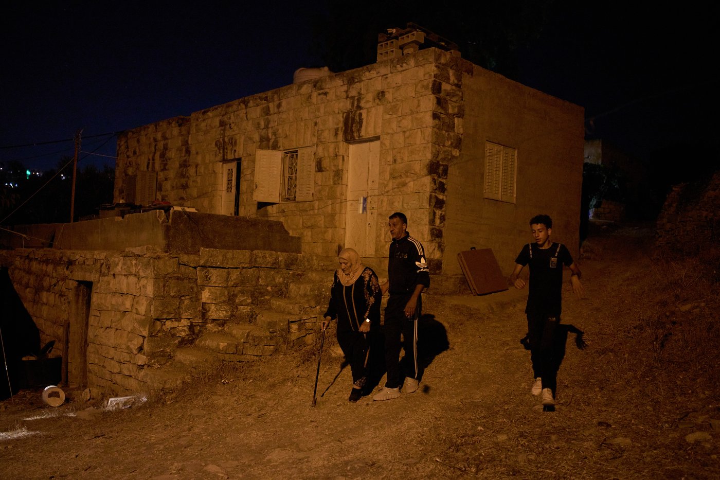 Photos show West Bank Palestinians keeping watch at night as settler violence grows | iNFOnews.ca