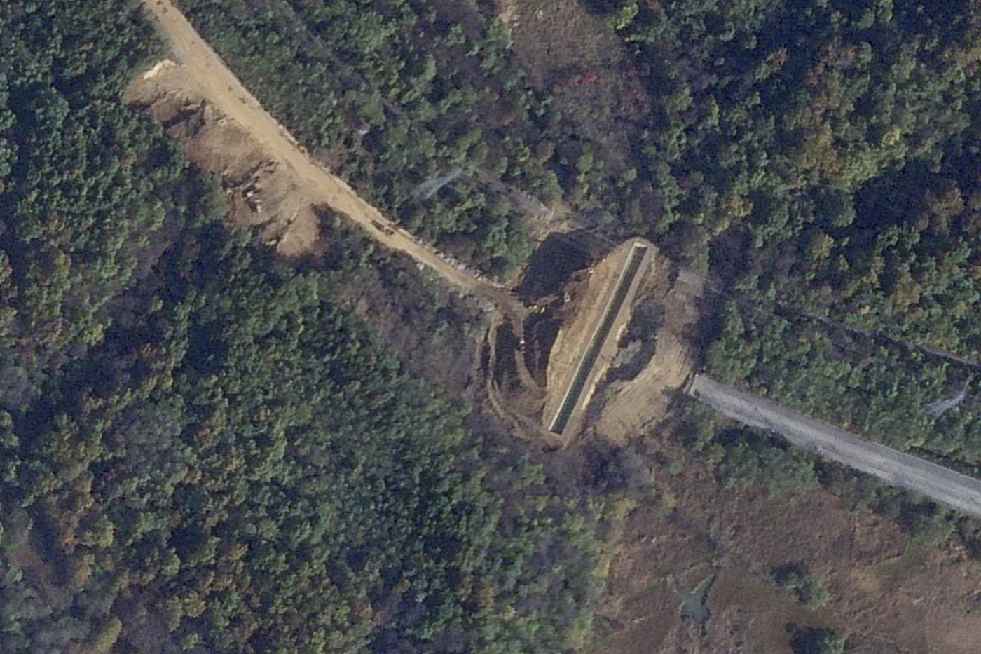 Satellite images show North Korea dug large border trenches after demolishing road, rail links | iNFOnews.ca Satellite images show North Korea dug large border trenches after demolishing road, rail links | iNFOnews.ca