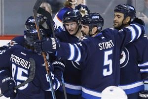 Jets announce injured defenceman Mark Stuart is out until February | iNFOnews.ca CP31167280