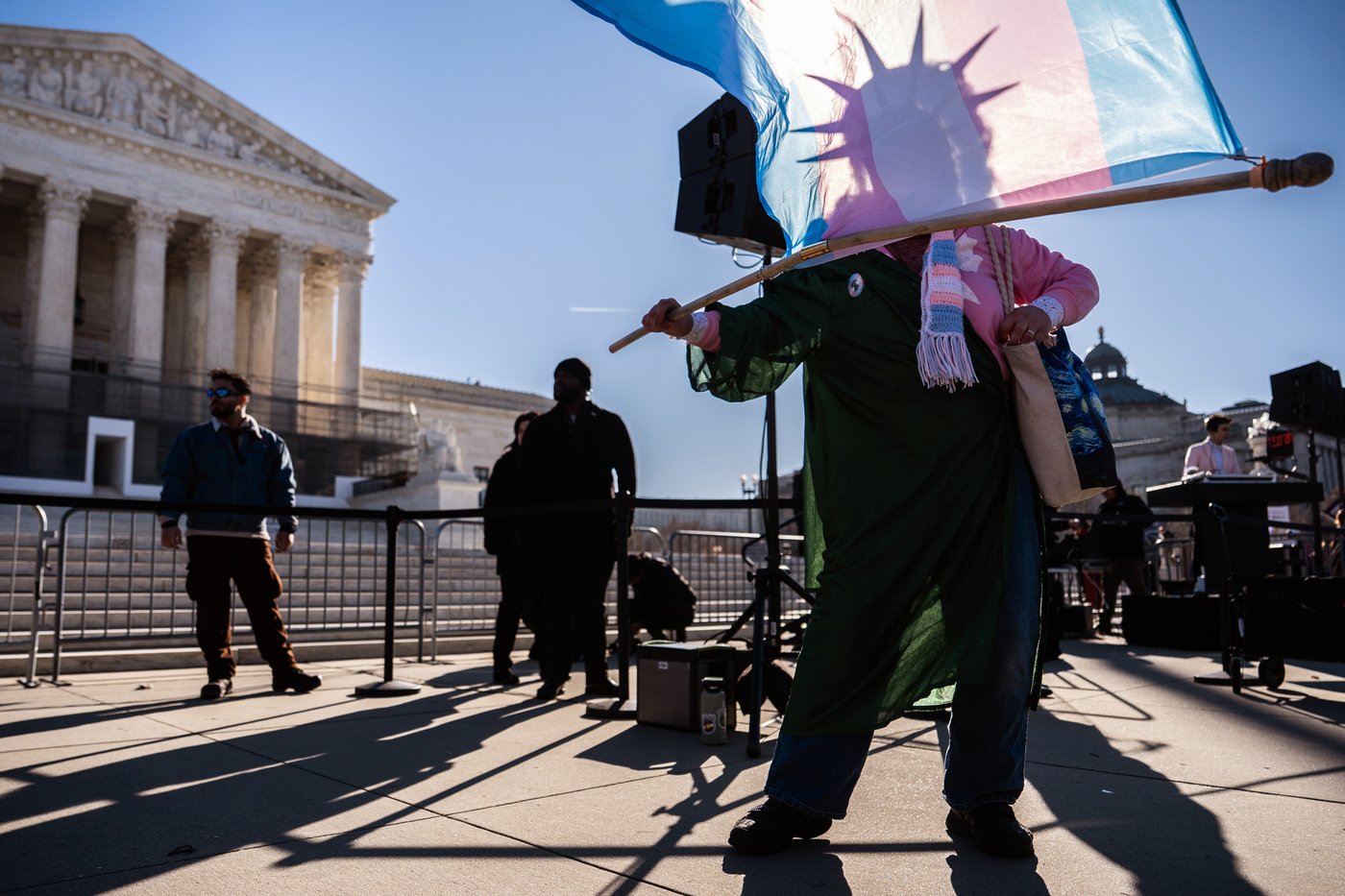 Photos of demonstrators outside the Supreme Court as it considers upholding transgender sports bans | iNFOnews.ca