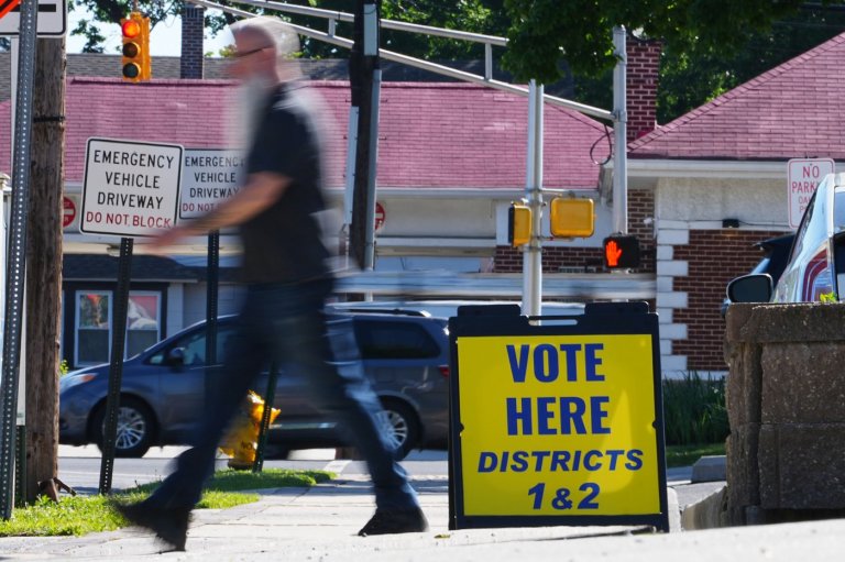 The Latest: Polls open for races across the US as a busy primary election day gets underway | iNFOnews.ca