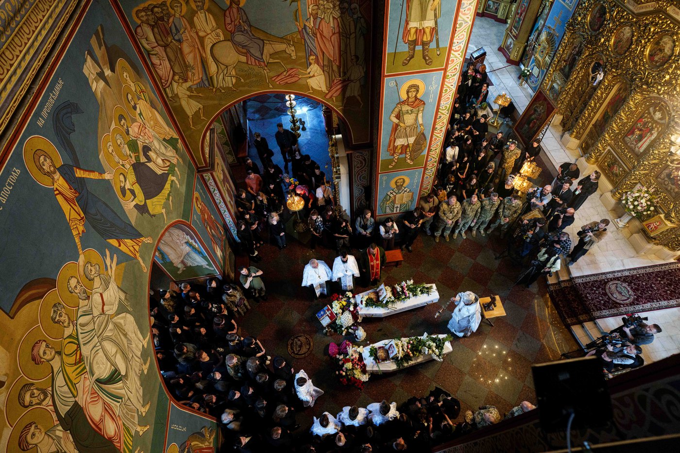 Kyiv holds a funeral for 2 young sisters killed by a Russian missile strike | iNFOnews.ca Kyiv holds a funeral for 2 young sisters killed by a Russian missile strike | iNFOnews.ca