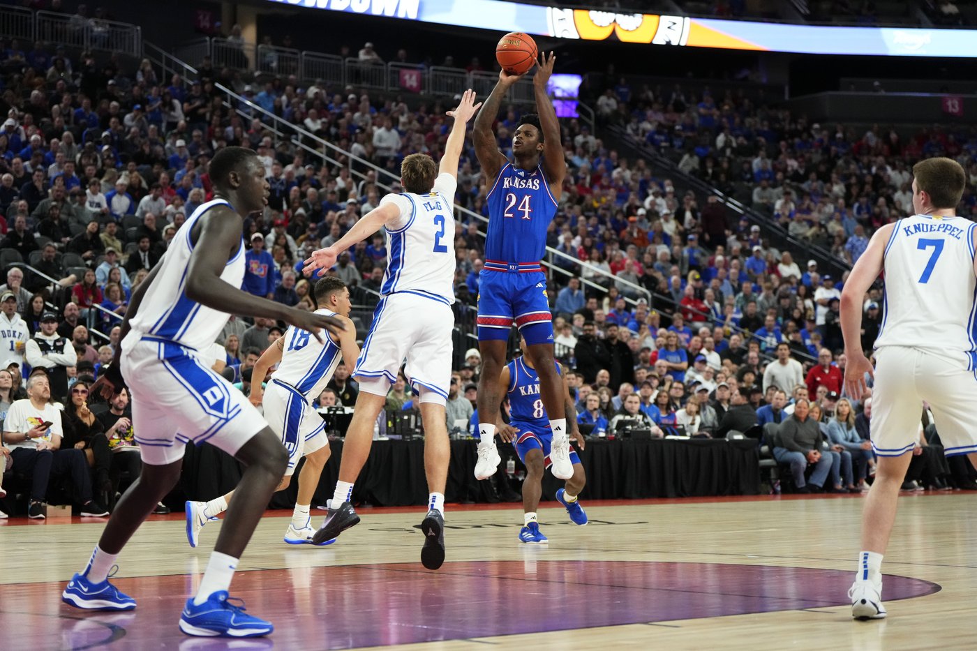 No. 1 Kansas holds off No. 11 Duke 75-72 after Dickinson ejected in the Vegas Showdown | iNFOnews.ca