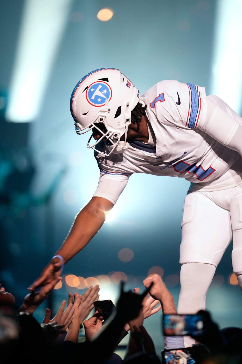 Titans unveil new uniforms and logos to go with new coach and new stadium opening in 2027 | iNFOnews.ca