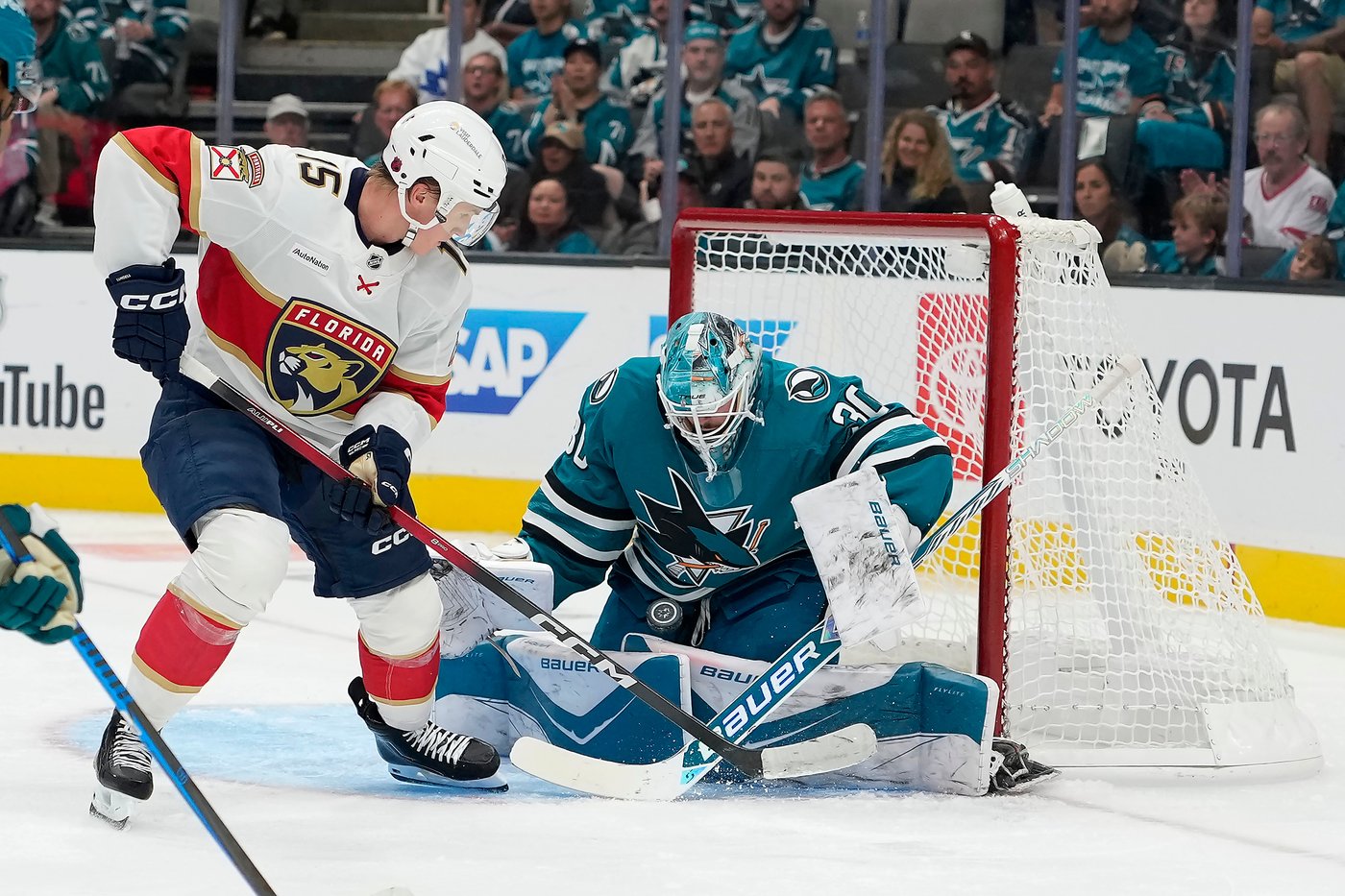 Luca Cagnoni scores in OT in the Sharks' season-opening victory over the Panthers | iNFOnews.ca