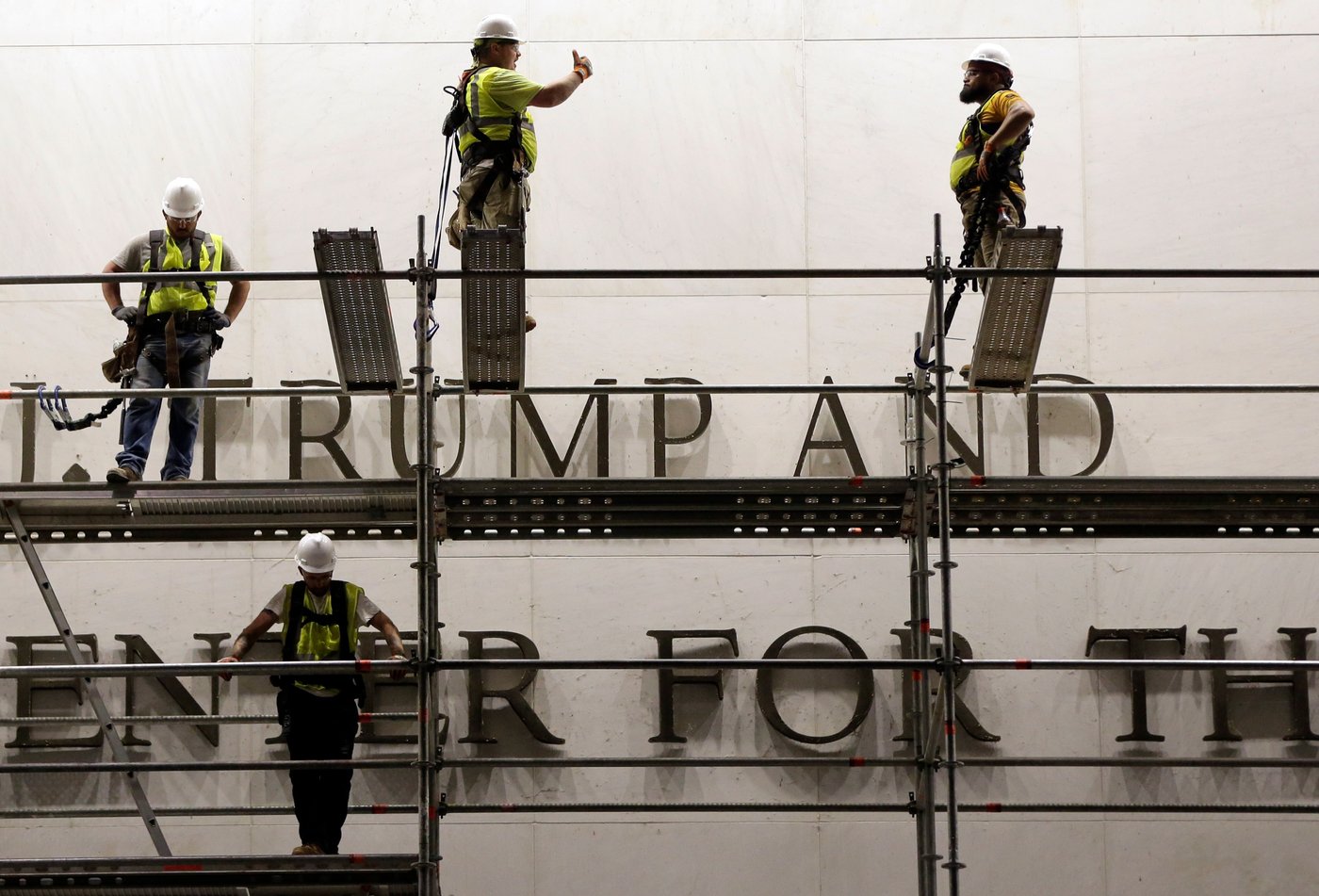 Workers prepare to remove Trump's name from the Kennedy Center, in photos | iNFOnews.ca