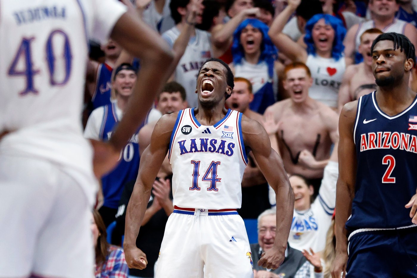 No. 9 Kansas beats top-ranked and previously undefeated Arizona 82-78 | iNFOnews.ca
