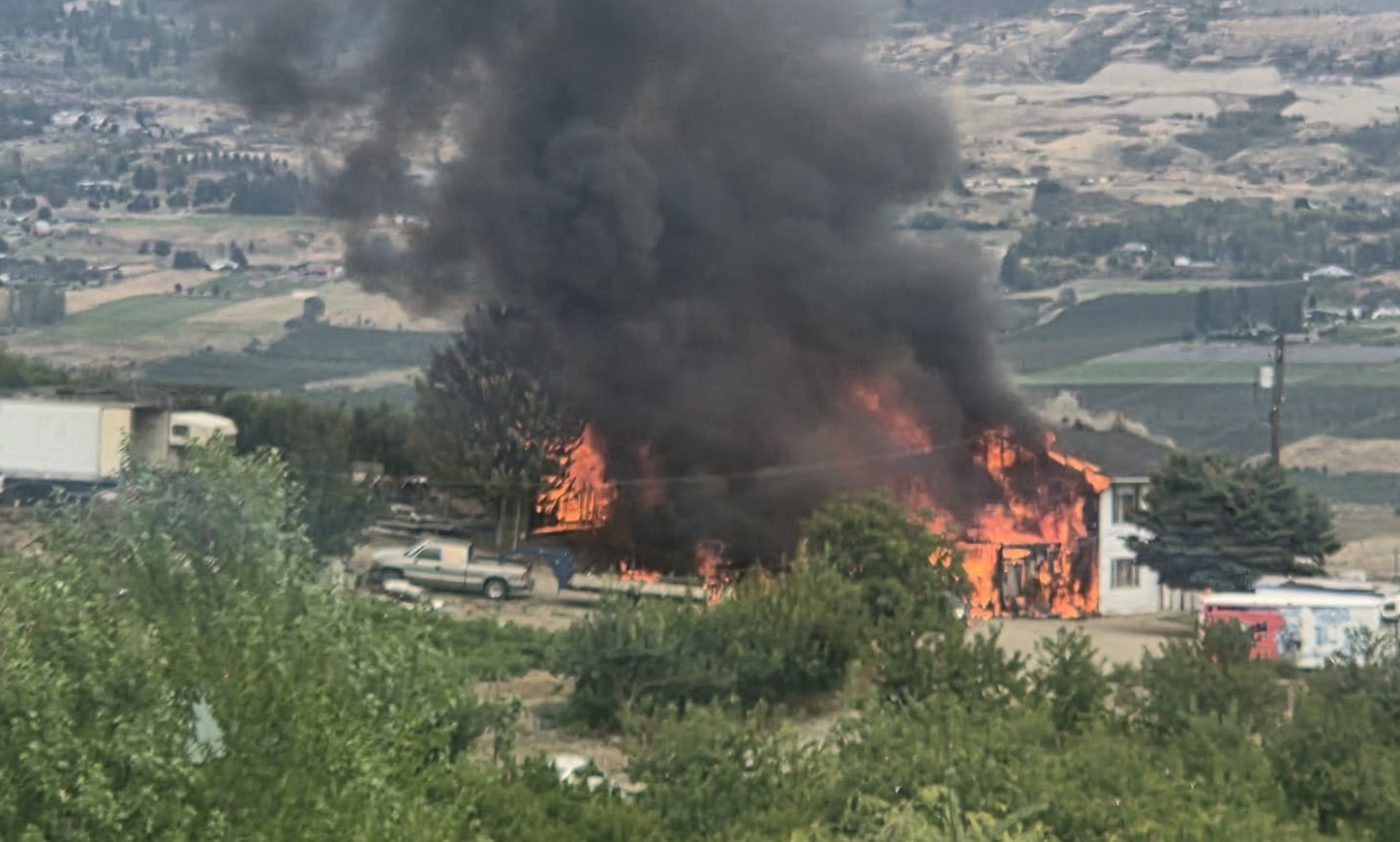 Black smoke and flames engulf a Vernon home.