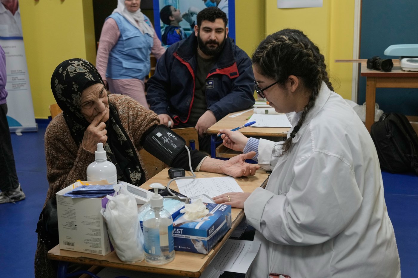 Photos of displaced civilians in Lebanon, where schools and stadiums turn into shelters during war | iNFOnews.ca