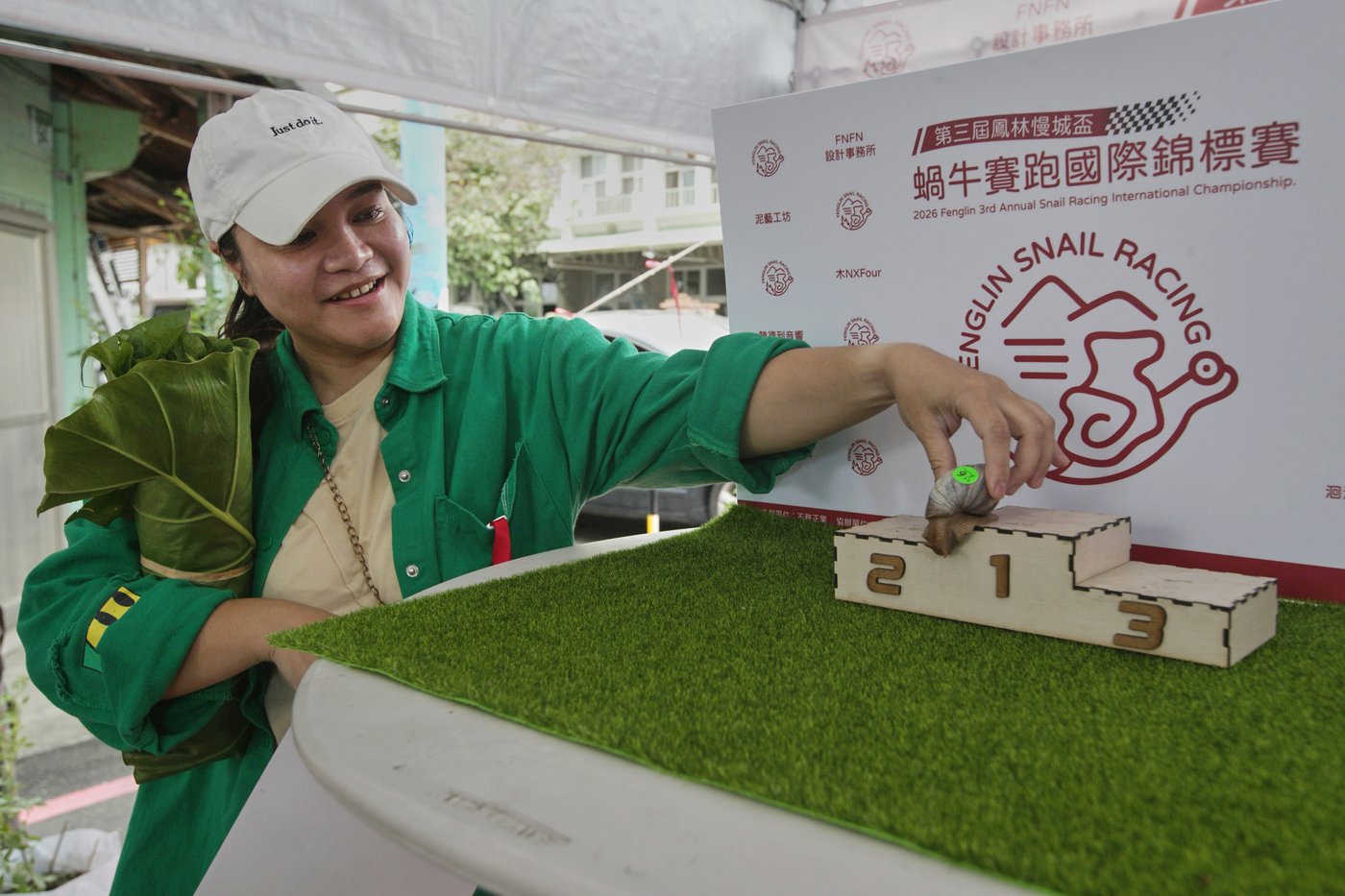 A Taiwanese town embraces a slow pace of life through a snail race | iNFOnews.ca A Taiwanese town embraces a slow pace of life through a snail race | iNFOnews.ca