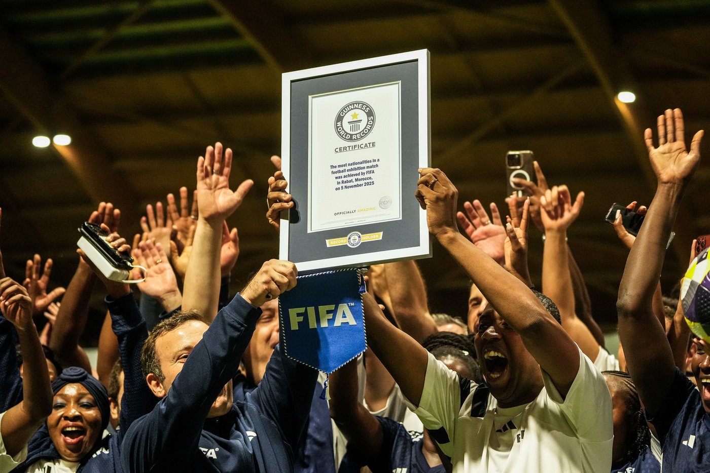 FIFA co-workers break Guinness World Record for most multinational soccer game | iNFOnews.ca FIFA co-workers break Guinness World Record for most multinational soccer game | iNFOnews.ca