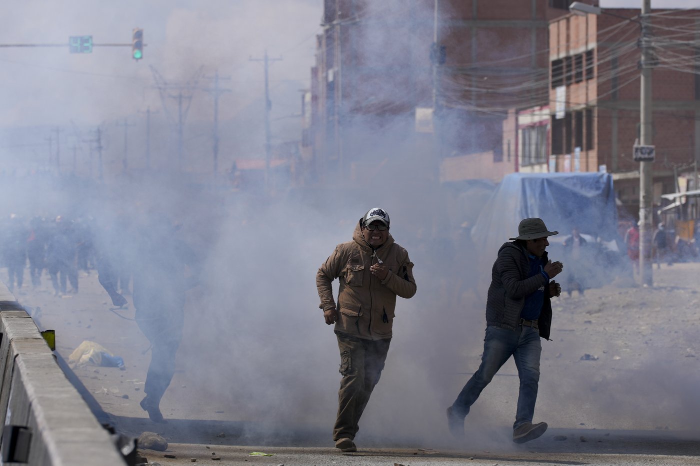 Rival protesters clash in Bolivia as ex-President Evo Morales leads a march to the capital | iNFOnews.ca Rival protesters clash in Bolivia as ex-President Evo Morales leads a march to the capital | iNFOnews.ca