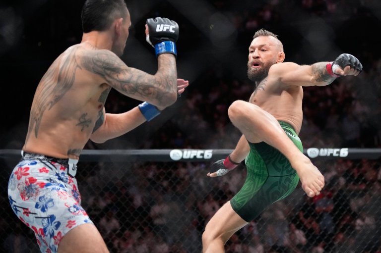 Conor McGregor suffers early knee injury in return, loses to Max Holloway at UFC 329 | iNFOnews.ca