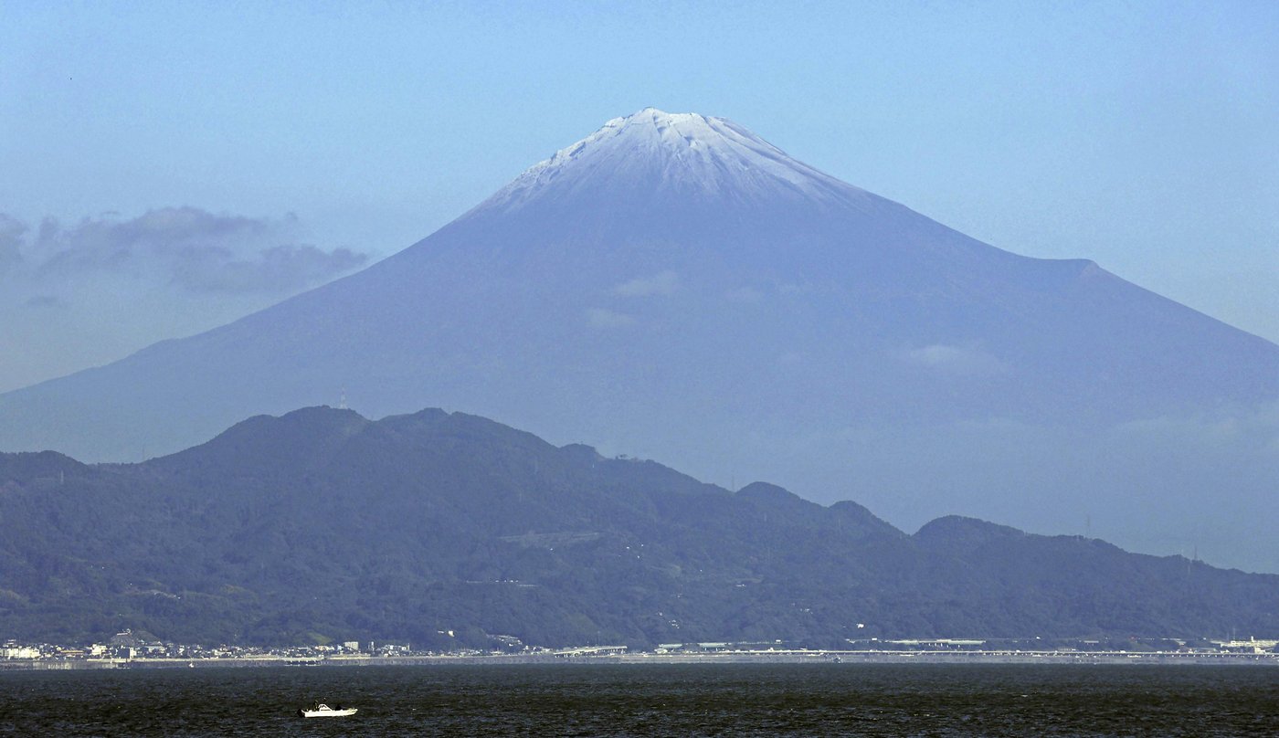 It's not official yet but Mount Fuji gets its trademark snowcap after the longest delay in 130 years | iNFOnews.ca