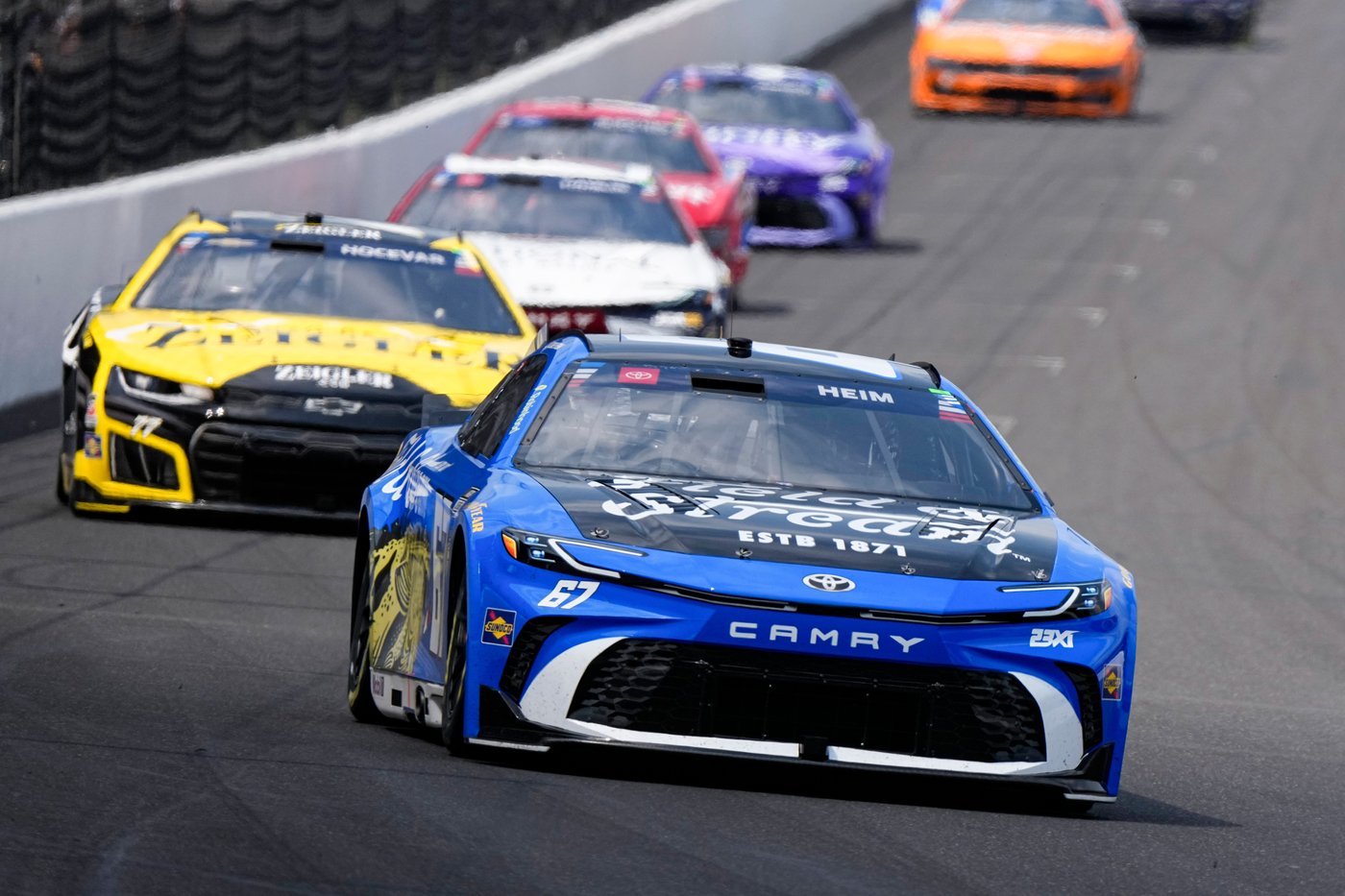 Corey Heim executes daring pass on final restart and holds on for historic Brickyard 400 victory | iNFOnews.ca