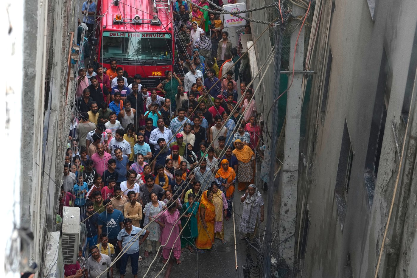 Photos show rescue efforts and aftermath of New Delhi building fire | iNFOnews.ca