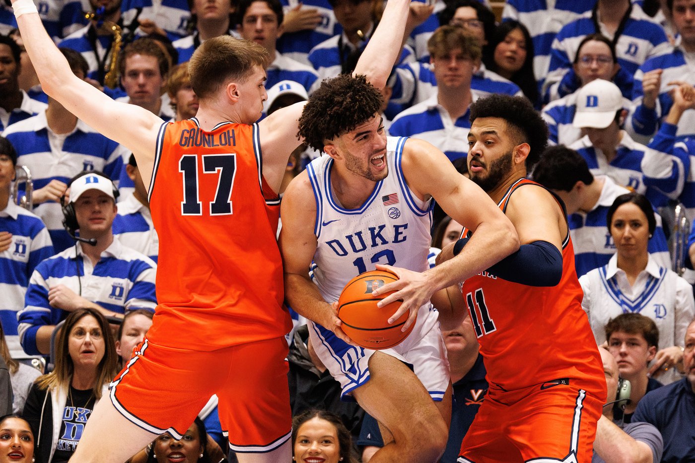 Evans, Boozer help No. 1 Duke beat No. 11 Virginia 77-51 to clinch ACC Tournament's top seed | iNFOnews.ca Evans, Boozer help No. 1 Duke beat No. 11 Virginia 77-51 to clinch ACC Tournament's top seed | iNFOnews.ca