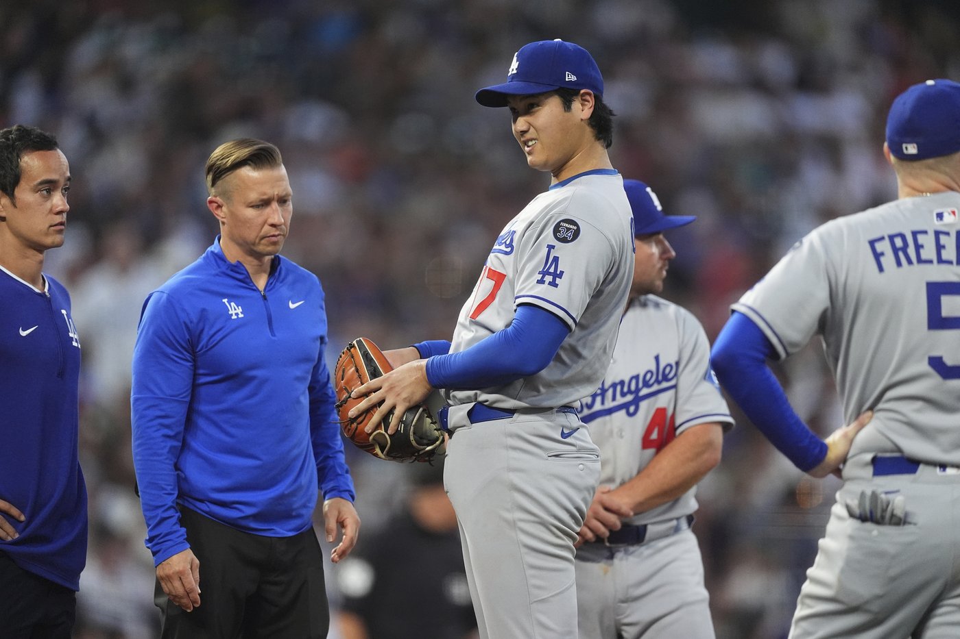 Dodgers' Ohtani roughed up by Rockies, leaves game after getting hit on right thigh by line drive | iNFOnews.ca