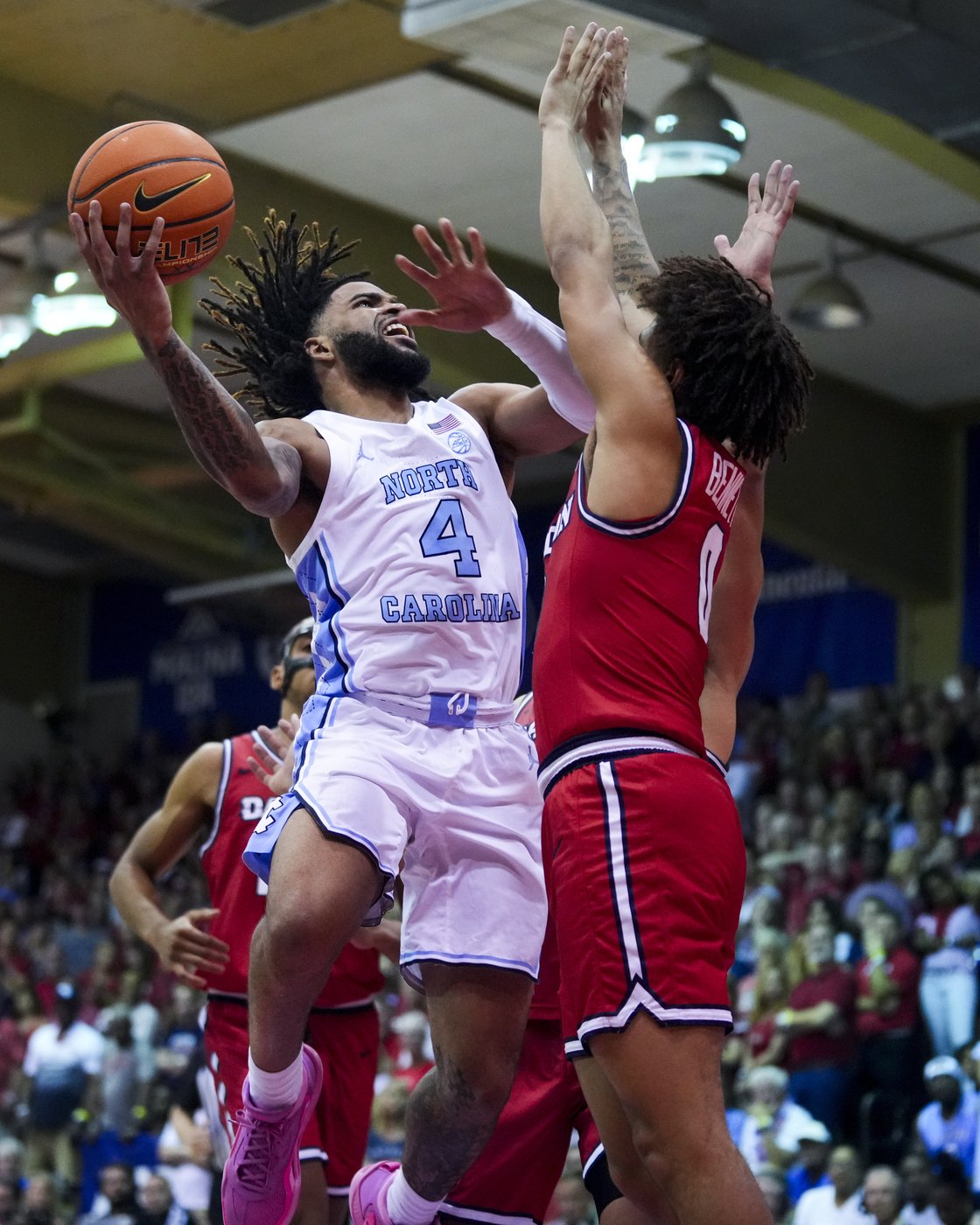 RJ Davis scores 30 as No. 12 Tar Heels erase 21-point deficit to beat Dayton 92-90 | iNFOnews.ca