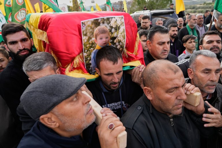 Village in southern Lebanon buries a child and father killed in Israeli drone strike | iNFOnews.ca