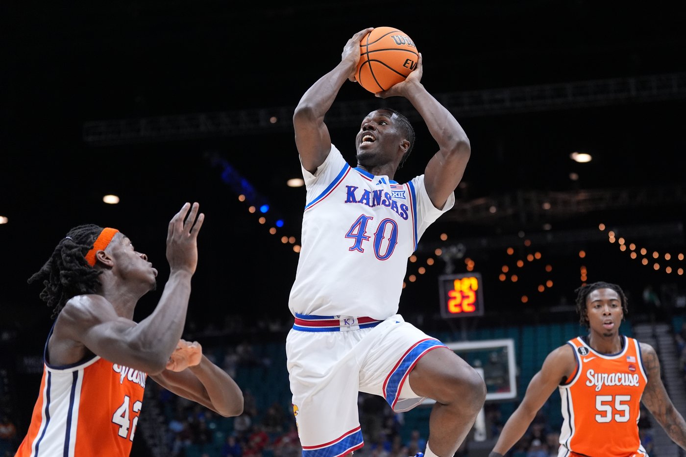 Double-doubles by Tre White and Flory Bidunga help Kansas beat Syracuse 71-60 at Players Era tourney | iNFOnews.ca
