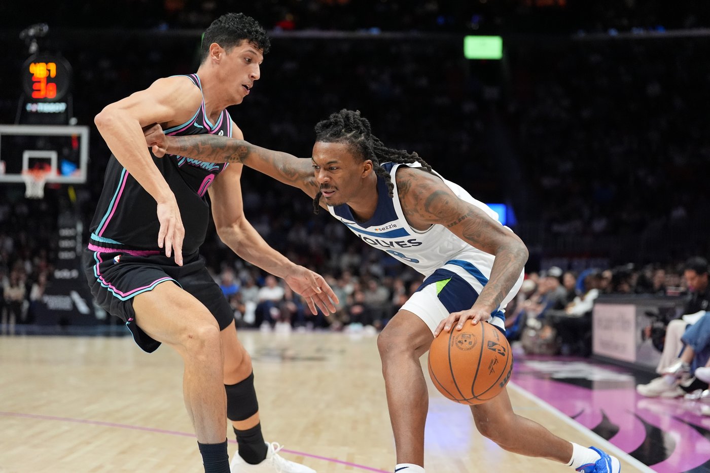 Edwards and Reid combine for 62, Timberwolves win 125-115 to snap Heat's 4-game winning streak | iNFOnews.ca