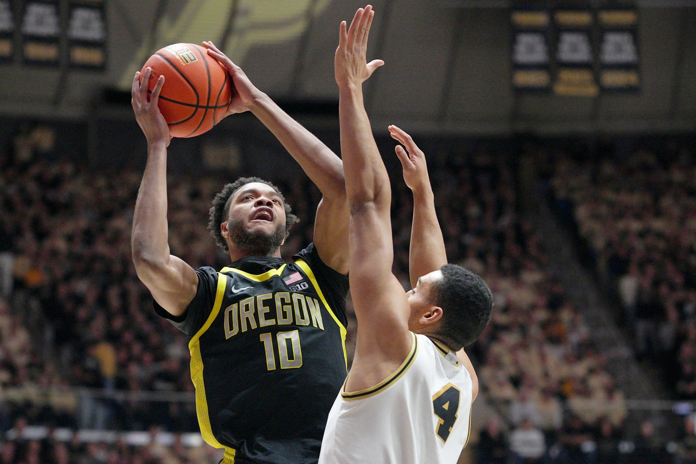 Fletcher Loyer's final minute-scoring flurry helps No. 12 Purdue rally late to get past Oregon 68-64 | iNFOnews.ca