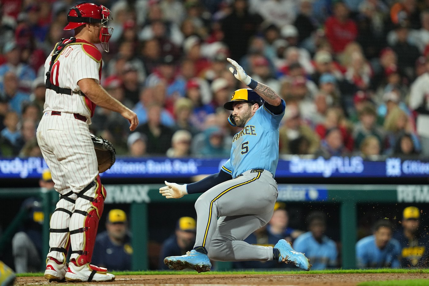 Wheeler fans 7 straight to open game, Stott hits tiebreaking single as Phillies beat Brewers 6-4 | iNFOnews.ca