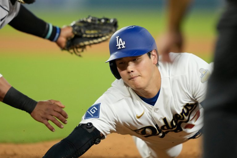 Dodgers open defense of back-to-back World Series titles with a win | iNFOnews.ca