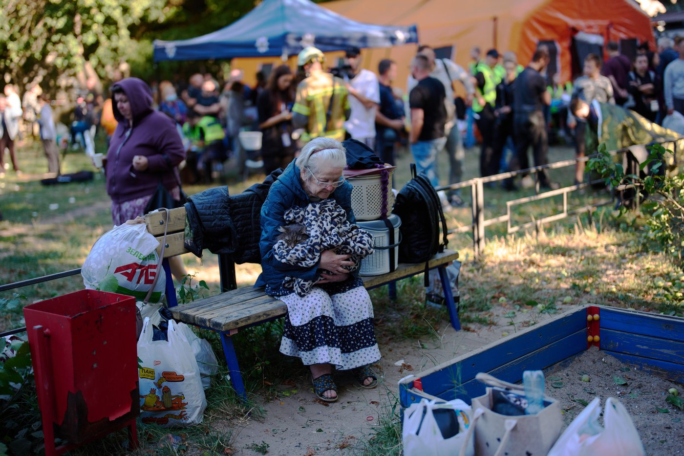 Photos show Kyiv residents clutching pets, collecting bodies after Russian missile and drone attack | iNFOnews.ca