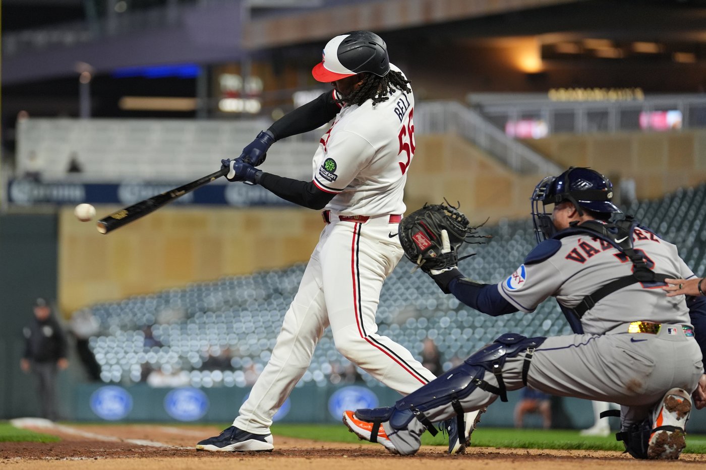 Josh Bell homers twice as Twins beat Astros 6-3 in game delayed nearly 2 hours by rain | iNFOnews.ca