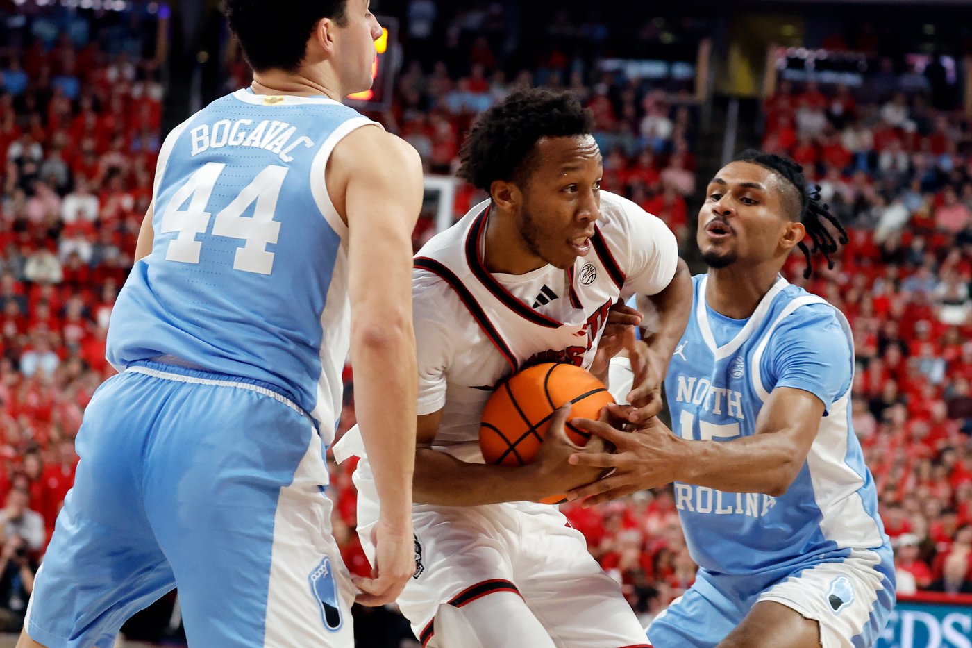 NC State rolls past 16th-ranked and injury-depleted rival North Carolina 82-58 | iNFOnews.ca