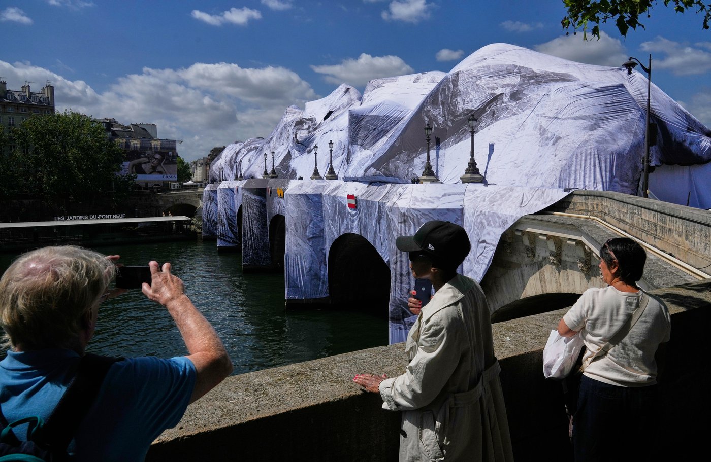 Artist JR, the 'French Banksy' creates a 'cave' installation over Paris' oldest bridge | iNFOnews.ca Artist JR, the 'French Banksy' creates a 'cave' installation over Paris' oldest bridge | iNFOnews.ca