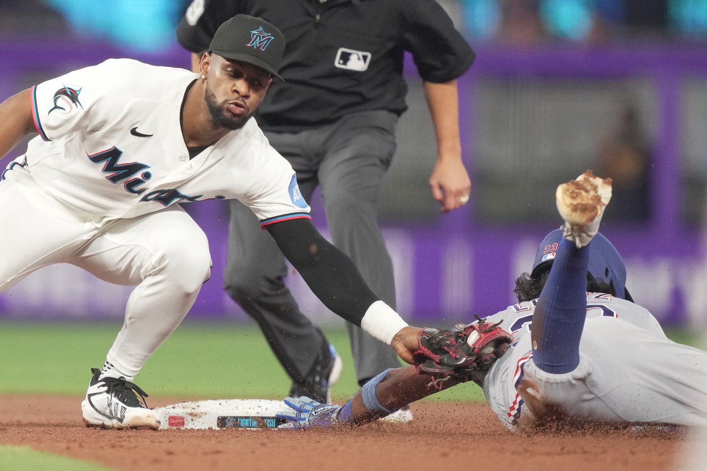 Otto López homers, has another multi-hit game and Marlins beat Rangers 4-2 | iNFOnews.ca
