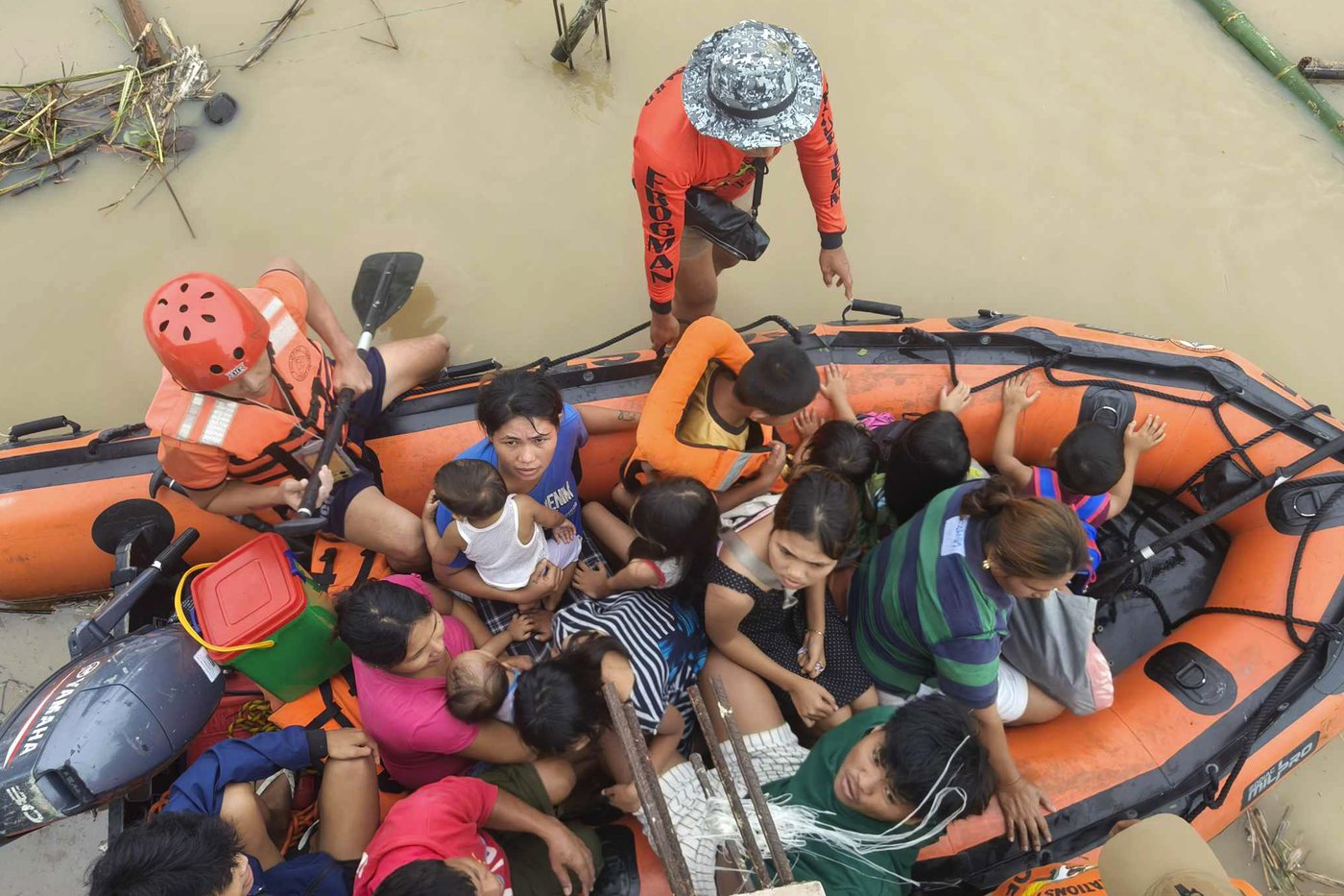 Floods in Philippines kill at least 9 and trap others on roofs as storm approaches | iNFOnews.ca