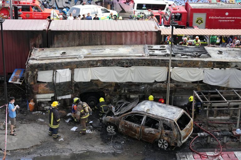 A cargo train hits a public bus at a Bangkok rail crossing, killing at least 8 | iNFOnews.ca