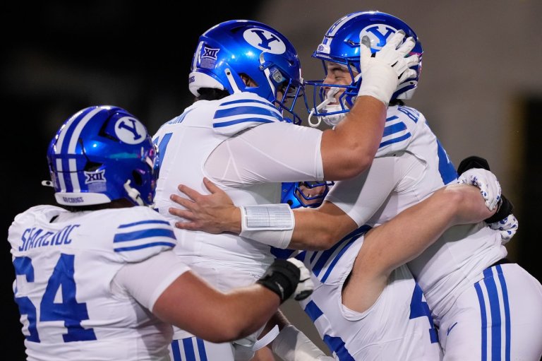 LJ Martin runs for career-high 222 yards to help No. 11 BYU beat Cincinnati 26-14 | iNFOnews.ca