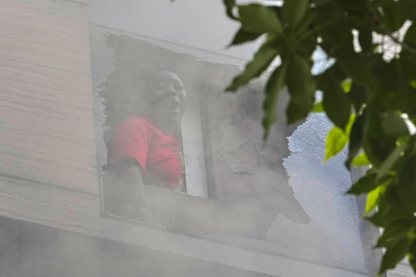 Photos show rescue efforts and aftermath of New Delhi building fire | iNFOnews.ca