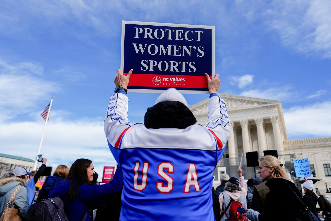 Photos of demonstrators outside the Supreme Court as it considers upholding transgender sports bans | iNFOnews.ca